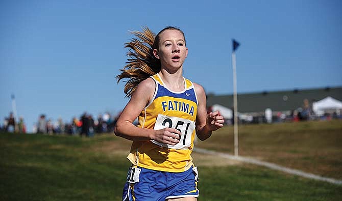 
Brianna Haller of Fatima runs Saturday on her way to a Class 2 cross country state individual title at the Oak Hills Golf Center in Jefferson City.