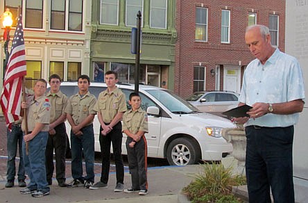 Callaway County Commissioner Doc Kritzer reads a proclamation honoring Vietnam-era veterans during the Daughters of the American Revolution "Wreath Laying Ceremony" early Tuesday night at Callaway County Courthouse as Boy Scout Troop #31 looks on. Veterans-related events and celebrations continue today, and local groups like VFW Post 2657 dedicate their appreciation efforts to veterans and the community year around.