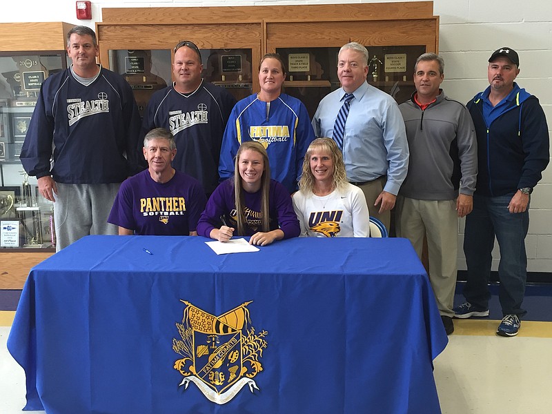 Sammey Bunch of Fatima High School (seated center) signs a letter of intent Wednesday to play softball at Northern Iowa. Also seated are her parents, Joe and Margie Bunch. Standing (from left) are coaches Greg Logston and Aaron Newton of Missouri Stealth, Dana Scheppers of Fatima, Jason Hirschvogel of Mid-Missouri Ricochet, and Brian Metz and John Burks of Mid-Missouri Madness.