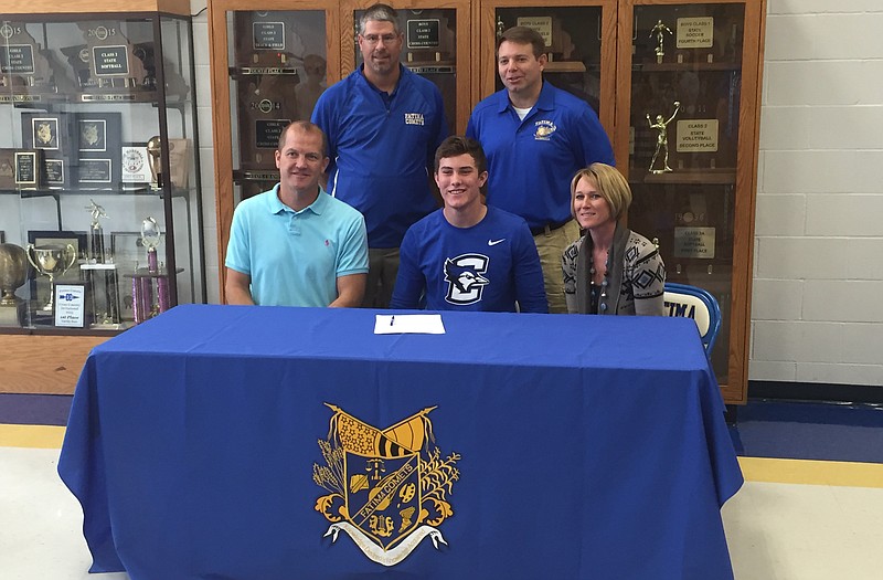 Will Robertson of Fatima High School (seated center) signs a letter of intent Wednesday to play at Creighton. Also seated are his parents Jon and Cindy Robertson. Standing (from left) are Fatima athletic director Mitch Gier and Fatima head baseball coach Scott Kilgore.