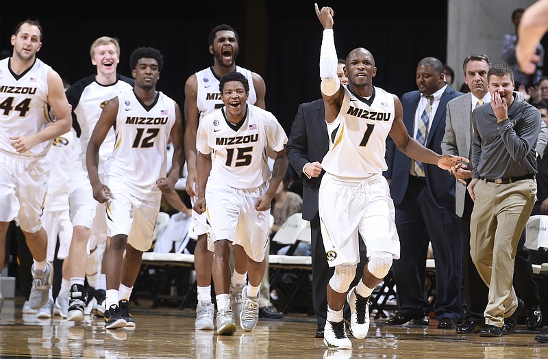 Led by Terrence Phillips (1), the Missouri bench celebrates as players rush the court as a timeout is called during the second half of Sunday's 73-55 victory against Maryland Eastern Shore at Mizzou Arena. Missouri returns to action today as it takes on Xavier in Cincinnati.