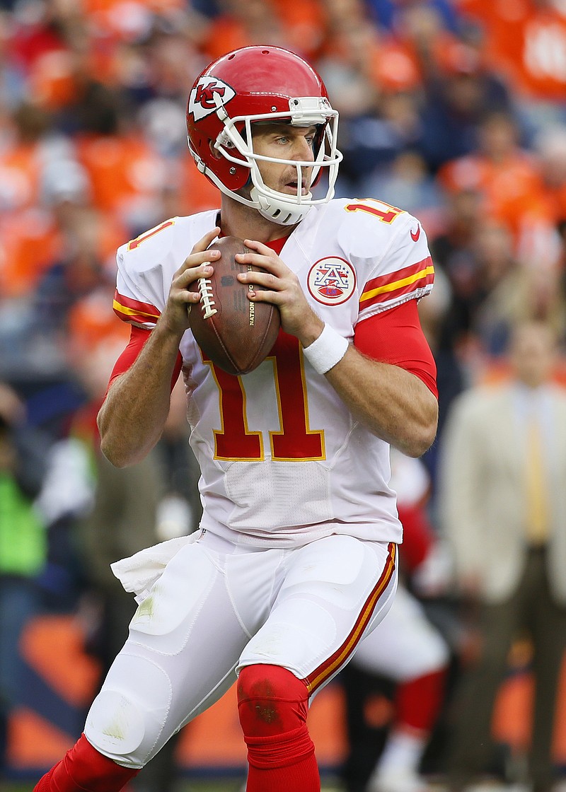 Chiefs quarterback Alex Smith looks to pass during last Sunday's game against the Broncos in Denver.