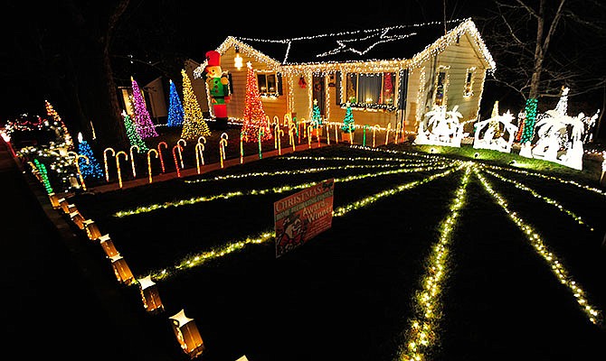 Decorated light display winners in 2014 included Roy Johnson at 1006 Washington St. for Jefferson City's Best.