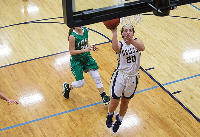 Olivia Johanns of Helias goes up for a layup during Tuesday night's game against Blair Oaks at Rackers Fieldhouse.