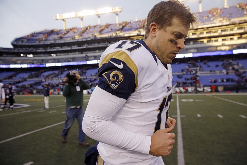 Rams quarterback Case Keenum runs off the field after last Sunday's game against the Ravens in Baltimore.