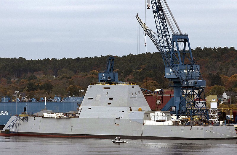 The Navy's stealthy Zumwalt destroyer is shown during building at Bath Iron Works in Maine. The Navy's largest destroyer cuts an imposing figure: massive in size, with an angular shape, hidden weapons, and an unusual hull that fell out of favor a century ago in part because it can be unstable.
