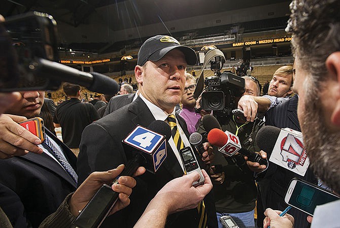 
Barry Odom answers questions Friday afternoon at Mizzou Arena after he was introduced as Missouri's new head football coach.
