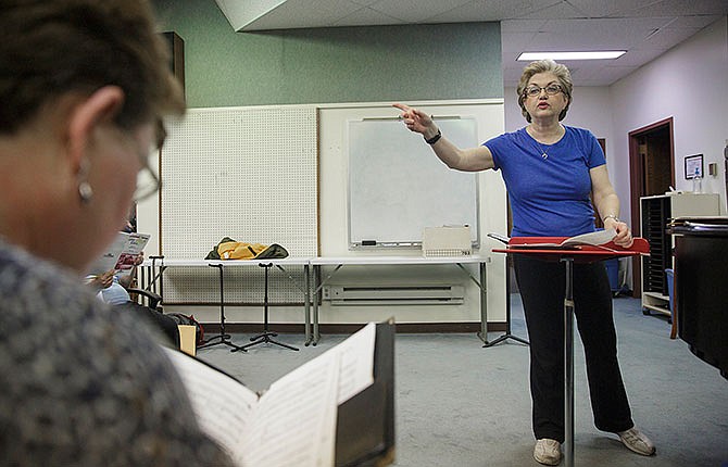 
Jefferson City Cantorum Director Suzanne Barner Kitchen leads the group in rehearsal Thursday, December 3. 