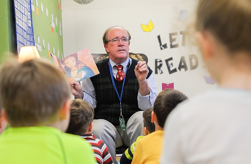 Principal Eddie Mulholland reads a story about the Nativity to the St. Martins Catholic School pre-kindergarten class.
