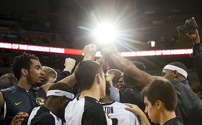 Members of the Missouri basketball team gather before Wednesday night's game against Omaha at Mizzou Arena.