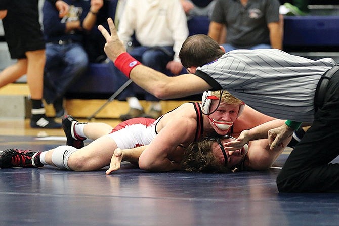 
Gavin DeWitt of Jefferson City is awarded two points during his 145-pound match in Saturday afternoon's championship dual against Neosho in the Missouri Duals at Rackers Fieldhouse.