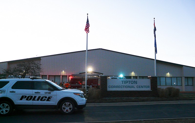 Emergency personnel lined the entrance of Tipton Correctional Thursday afternoon, Dec. 10, 2015, when smoke was detected in the administration building.