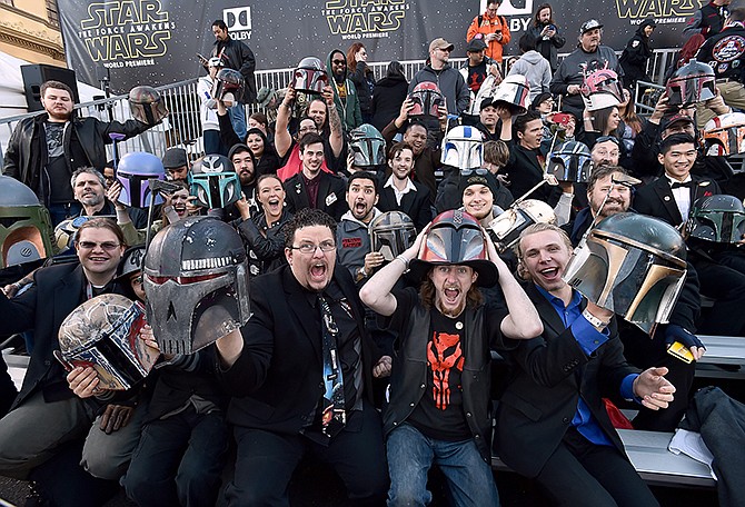 Fans cheer in the stands at the world premiere of "Star Wars: The Force Awakens" Monday in Los Angeles. The film opens nationwide today. 