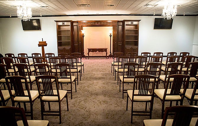 
The renovated sanctuary at Freeman Mortuary has been expanded and includes new features like the memory shelves, where family members can display photos and mementos of their loved ones. An audiovisual system has also been added to the space.