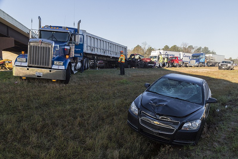 A wreck occurred on the southbound lane of Interstate 49 about 11:45 p.m. Monday, Dec. 21, 2015, near Fouke, Ark. According to Lt. Brady Gore of Arkansas State Police Troop G, said a  tractor-trailer slowed in dense fog. The truck was struck from behind. Then, the driver of a Conway tractor trailer was struck and killed after stepping out of the vehicle. The accident killed three people, wrecked 10 cars on the southbound side of I-49 and three trucks on the northbound side, and 10 people were taken to CHRISTUS St. Michael Health System and Wadley Regional Medical Center. State police and emergency workers were still investigating and clearing the scene Tuesday morning.