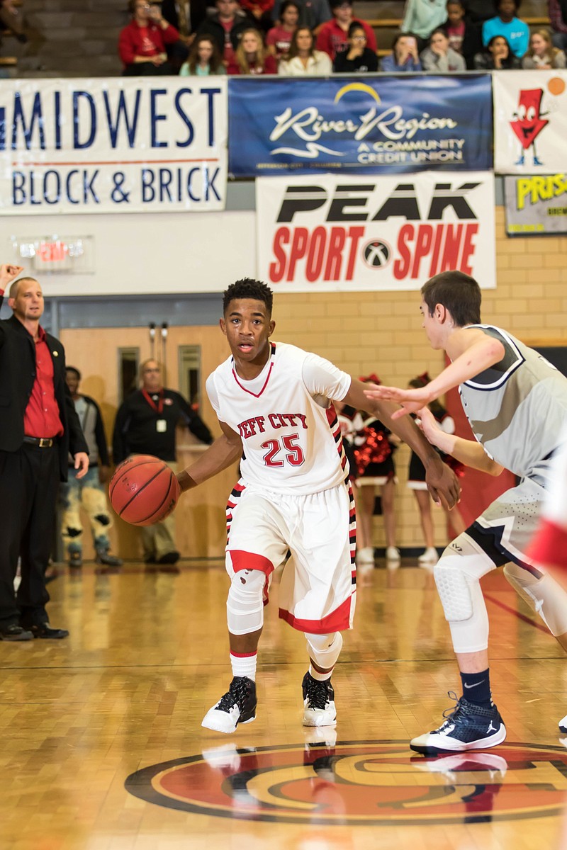 Kamari Balton of the Jays brings the ball up the court during Monday night's game against Kettering (Ohio) Fairmont at Fleming Fieldhouse.