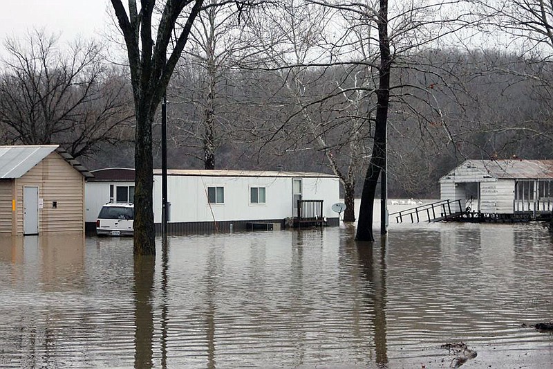 Homes and businesses in downtown Gravois Mills received flood damage as levels rose at Lake of the Ozarks, which topped nearly four feet above full pool from heavy rains that blanketed the region from Dec. 25-28. 