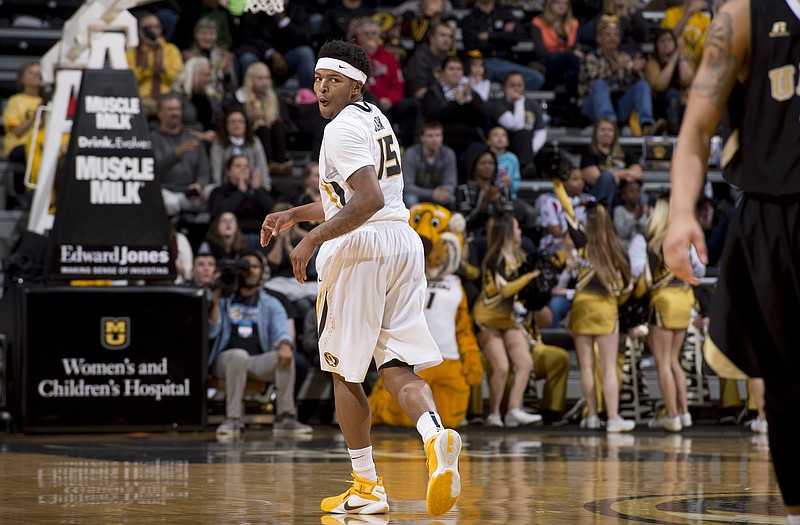 Wes Clark of Missouri looks back after he made a 3-pointer during a game against Arkansas-Pine Bluff last month at Mizzou Arena.