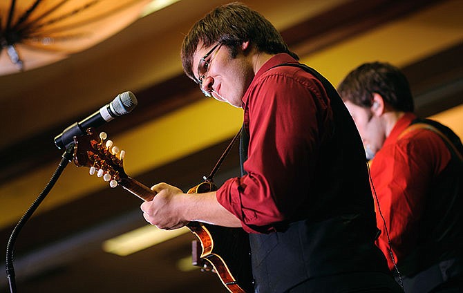 Bluegrass Martins mandolinist Lee Martin plays alongside his award-winning siblings as the Jefferson City-based band performs in front of a hometown crowd on Saturday, Jan. 9, 2016, the final day of the 42nd annual Society for the Preservation of Bluegrass Music of America (SPBGMA) Bluegrass Music Awards and 33rd annual Midwest Convention.

