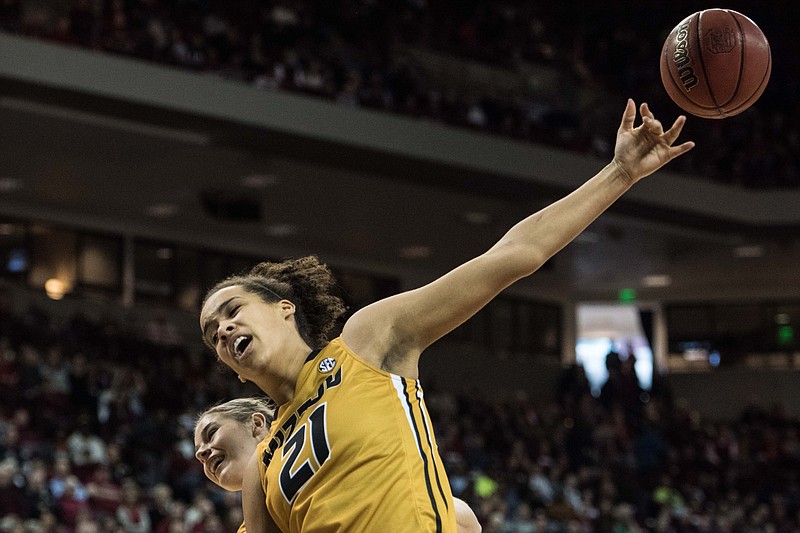 Cierra Porter of Missouri attempts to grab a rebound during the first half of Saturday's game against South Carolina in Columbia, S.C.