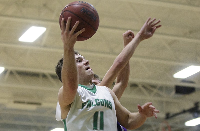 Jordan Hair of Blair Oaks goes up for a shot during Tuesday night's game against Hallsville in Wardsville.
