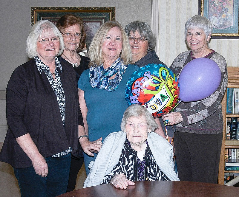 Ova McCoy, seated, on her 109th birthday on Jan. 10, is joined by several people, including, from left, granddaughter Debbie McCoy, granddaughter-in-law Kay McCoy, granddaughter Renee Burrows, granddaughter Kayleen Miles and long-time friend Pam Liebi.