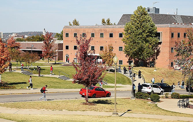 In this Oct. 19, 2015 file photo, students are seen crossing Chestnut Street on the Lincoln University campus in Jefferson City.