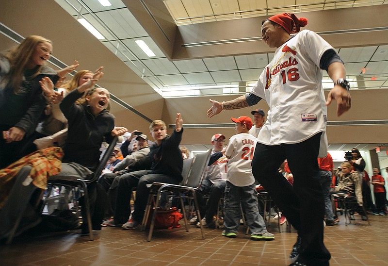 Second baseman Kolton Wong makes his entrance to the cheers of more than 500 in attendance during Friday night's stop for the 2016 Cardinals Caravan.