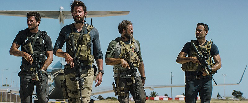 Pablo Schreiber, from left, as Kris "Tanto" Paronto, John Krasinski as Jack Silva, David Denman as Dave "Boon" Benton and Dominic Fumusa as John "Tig" Tiegen, are shown in a scene in the film "13 Hours: The Secret Soldiers of Benghazi."