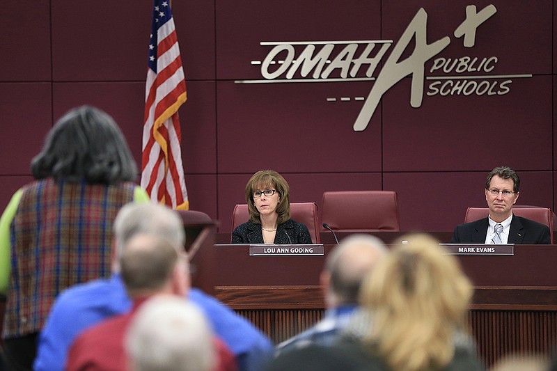  In this Jan. 4, 2016 photo, Omaha Public Schools board President Lou Ann Goding and OPS superintendent Mark Evans listen to public comments during a meeting in Omaha, Neb., on plans to update the district's sex education curriculum for the first time in 30 years. Sex education in the U.S. has a long and checkered history, winning the backing of the U.S. Public Health Service in 1940, gaining traction in the 1980s during the early years of the AIDS epidemic, but generating steady opposition from social conservatives.