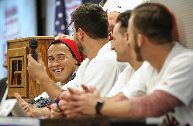 Cardinals second baseman Kolton Wong cracks a smile following pitcher Tyler Lyons' answer to a question last Friday night during the Cardinal Caravan's stop at the Missouri Farm Bureau Center.