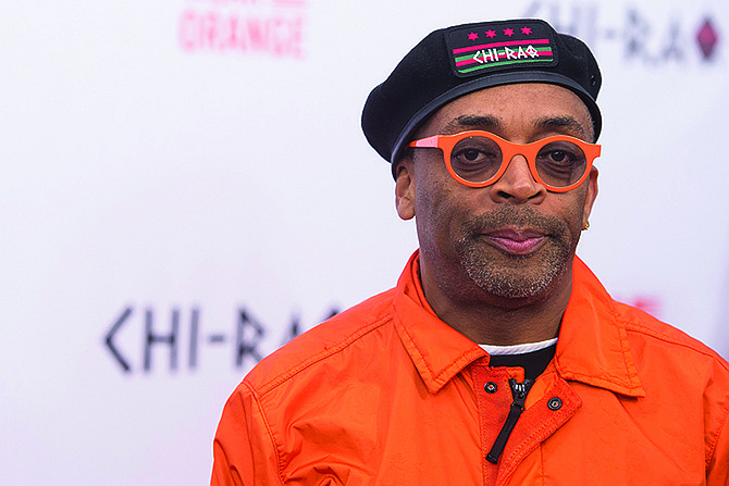 Film director Spike Lee, left, said Monday he will not attend this year's Academy Awards ceremony.