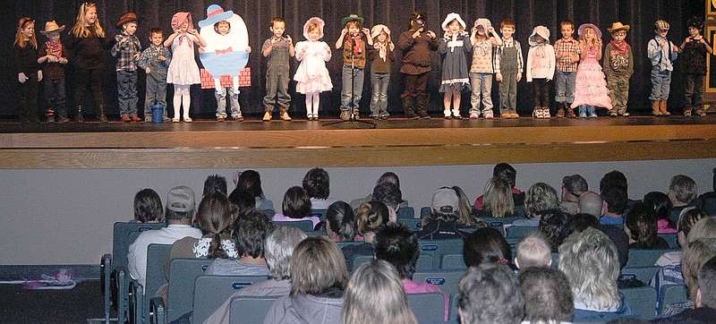 Kindergarteners in Courtney Stratton's class perform Mary Had a Little Lamb at Kindergarten Nursery Rhyme Day before an audience of friends and family. The event was held in the California High School auditorium the after noon of Friday, Jan. 15.