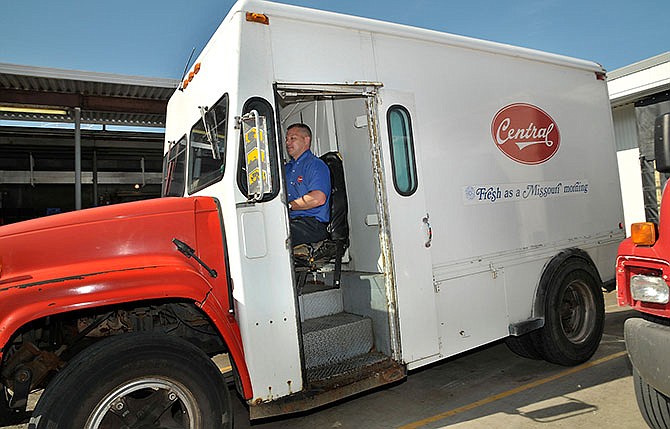 2011 FILE: Gary Sanders moves a truck to load it in preparation for overnight delivery from Central Dairy in Jefferson City.