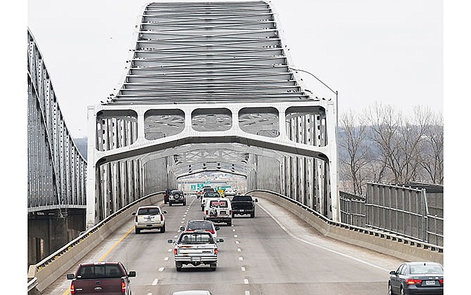 Vehicles travel onto the Missouri River bridge carrying eastbound U.S. 54 and northbound U.S. 63 traffic in Jefferson City on Tuesday, Jan. 26, 2016.