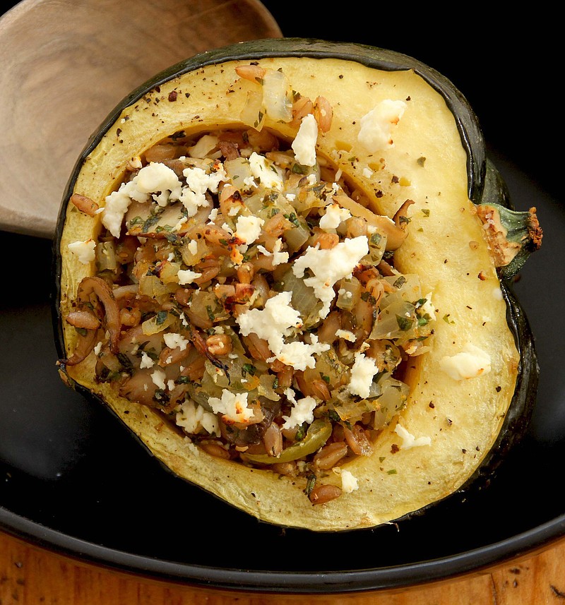 An acorn squash stuffed with mushrooms, farro and citrus.