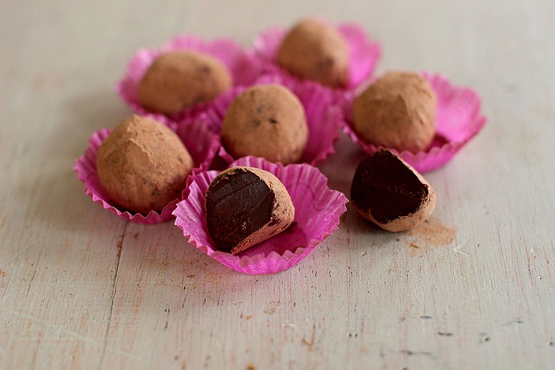 Chai spice chocolate truffles are dark and dense orbs, infused with cream and the gorgeous sweet spices ordinarily used in chai, including ginger, cinnamon, cardamom and cloves. 