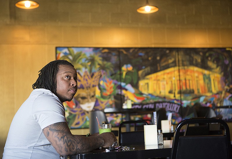 Justin Wright has a enjoys the Bob Marley Thursday, Feb. 4, 2016 at Twin City Daiquiri. The bar/ restaurant on State Line Ave. recently opened featuring hand made daiquiris and other cocktails. 