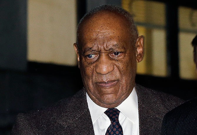 Actor and comedian Bill Cosby leaves after a court appearance Wednesday, Feb. 3, 2016, in Norristown, Pa. Common Pleas Judge Steven O'Neill refused to throw out the sexual assault case against Cosby on Wednesday, sweeping aside a former district attorney's claim that he granted the comedian immunity from prosecution a decade ago. O'Neill issued the ruling after a hard-fought two-day hearing, saying witness credibility was a factor. He did not elaborate.