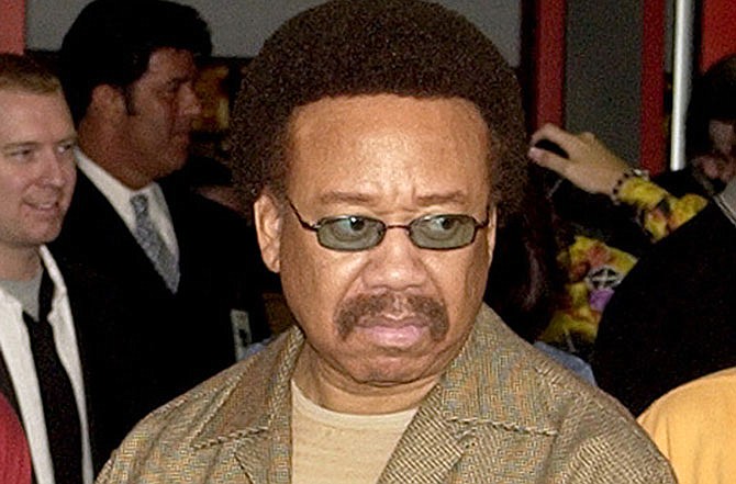 In this July 7, 2003 file photo, Maurice White, of Earth, Wind, & Fire, appears at an induction ceremony at the Hollywood Rock Walk in the Hollywood section of Los Angeles. White, the founder and leader of Earth, Wind & Fire, died at home in Los Angeles, Wednesday, Feb. 3, 2016, said his brother, Verdine White. He was 74.