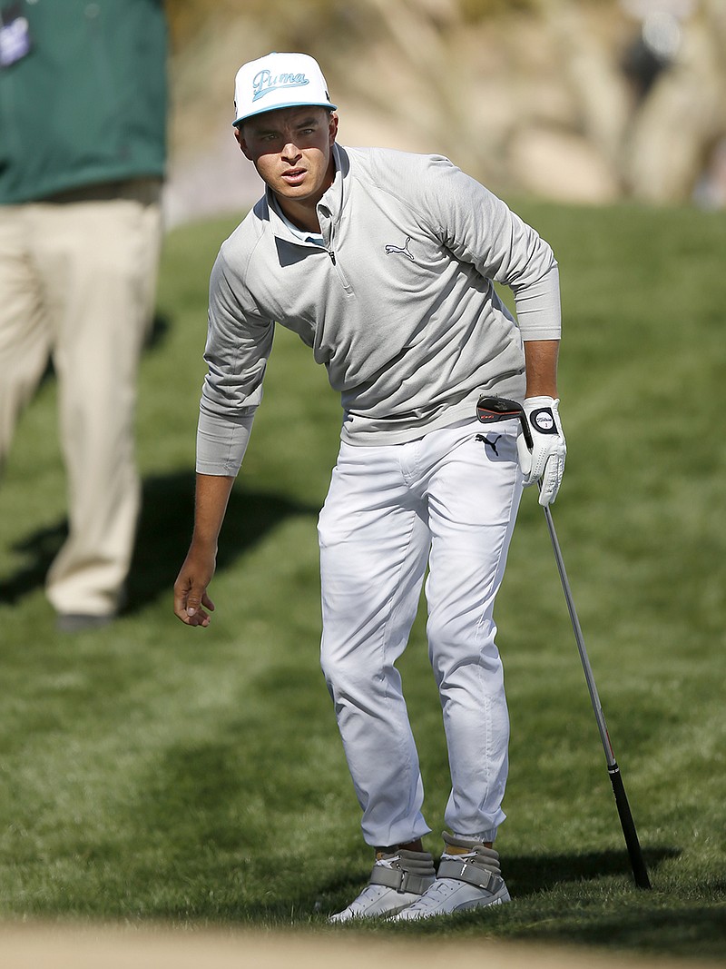 Rickie Fowler on the second hole during the first round of the Phoenix Open golf tournament, Thursday, Feb. 4, 2016, in Scottsdale, Ariz. 
