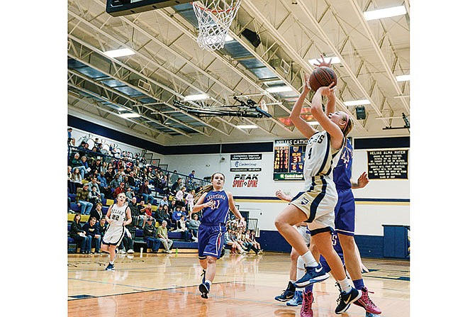 Luci Francka of Helias goes up for a shot during Saturday's game against California in the Central Bank Shootout at Rackers Fieldhouse in Jefferson City.