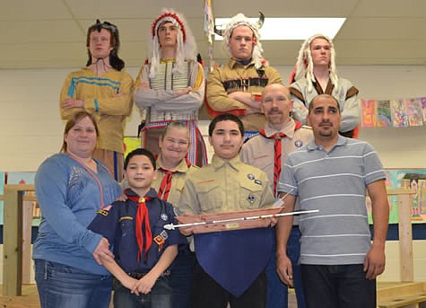 Cub Scout group includes, front row, from left, Lucia Bryant, Bear Cub Scout Salvatore Vasquez, Rose Blair, Diego Alexander Vasquez, Cubmaster Brad Friedmeyer and Moises Vasquez; back row, Members of Boy Scout Order of the Arrow.