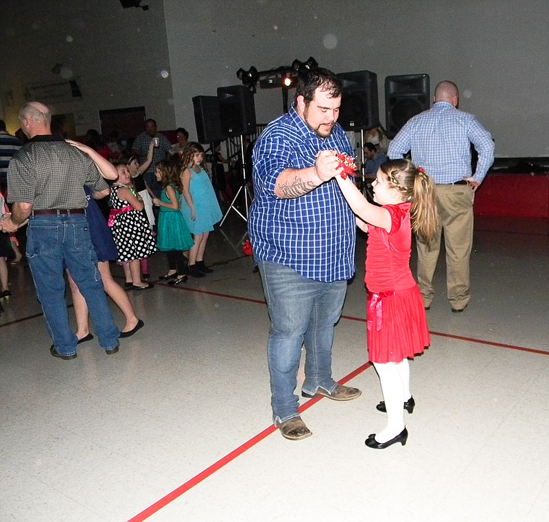 Many dressed up in their best outfits to attend the Special Guy Dance at California Elementary Saturday night. Approximately 200+ attended the dance sponsored by the California PTO.