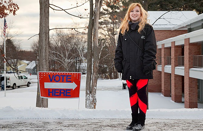 Nicole Reitano, 24, who voted for Democratic presidential candidate, Sen. Bernie Sanders, I-Vt., poses for a portrait outside her polling place at Broad Street Elementary in Nashua, N.H., Tuesday, Feb. 9, 2016, during the New Hampshire primary. "I felt like he was the most honest," said Reitano, an embroiderer, of her decision to pick Sanders over Hillary Clinton in the Democratic primary. "He's had the same views forever and he's never budged. That makes me feel confident in him."