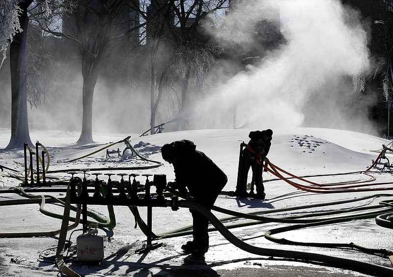 Snow is made Tuesday, Jan. 19, 2016, for Winter Jam, a festival of free, snow-based activities in Central Park in New York. The Jan. 23 festival was canceled because of a major snowstorm, and now the ice festival planned for Feb. 13 has been canceled because of the cold. Heavy lake-effect snow and cold temperatures are expected in parts of central and western New York.