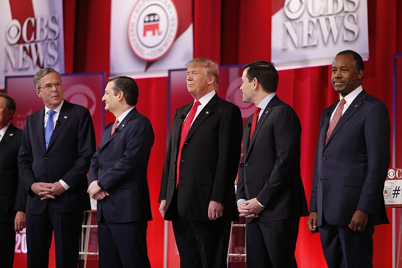 Republican presidential candidates, from left, Ohio Gov. John Kasich, former Florida Gov. Jeb Bush, Sen. Ted Cruz, R-Texas, businessman Donald Trump, Sen. Marco Rubio, R-Fla., retired neurosurgeon Ben Carson take the stage before the CBS News Republican presidential debate at the Peace Center, Saturday, Feb. 13, 2016, in Greenville, S.C. 