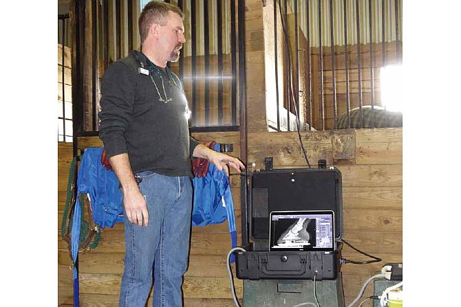 Dr. Paul Schiltz explains the new digital radiography system William Woods University was able to purchase through a USDA Rural Development grant. The addition of the system allows improved care for the school's horses as well as providing hands-on experience for students who are moving into a career in the equine industry.