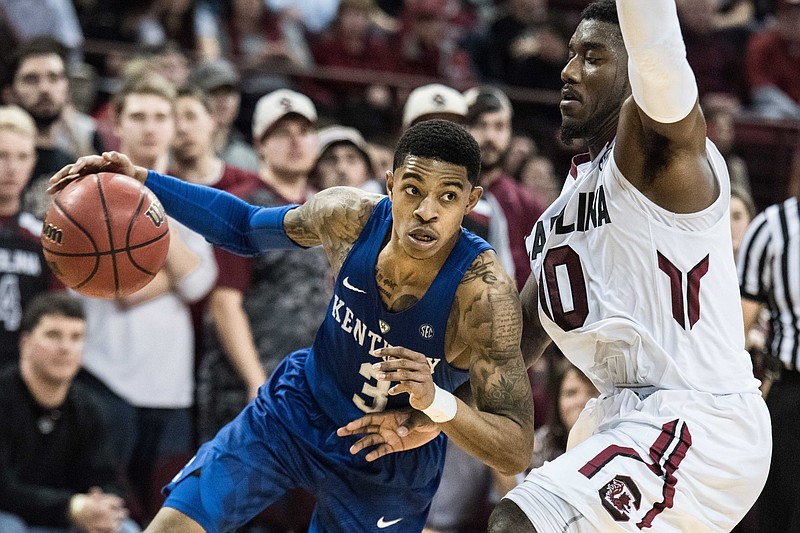 Kentucky guard Tyler Ulis (3) drives to the hoop against South Carolina guard Duane Notice (10) during the second half Saturday, Feb. 13, 2016 in Columbia, S.C. Kentucky defeated South Carolina, 89-62.