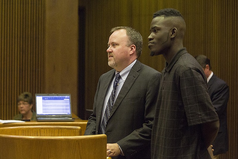 Tevin Willis stands with Texarkana lawyer Derric McFarland before a Bowie County judge on Thursday, Mar. 3, 2016 for a pretrial hearing in a sexual assault case. Willis and co-defendant Rickey Mask allegedly attacked a 14-year-old girl in a Texarkana, Texas, apartment in August 2014.
